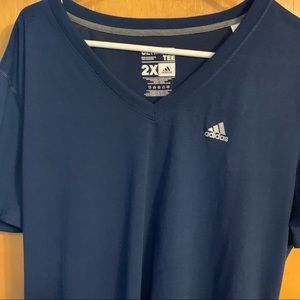 Adidas navy blue short sleeve v-neck t shirt.